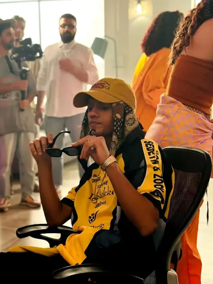 A candid moment on a shoot, capturing the fun and relaxed vibe behind the scenes.