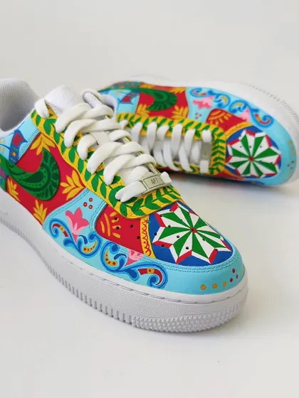 This is what I live for, turning a classic pair of Nike Air Force 1s into a vibrant canvas. I hand-painted this pair with a mix of colourful Indian folk patterns and motifs. Every detail is meticulously painted to create a truly one-of-a-kind piece of wearable art that’s guaranteed to be a conversation starter.