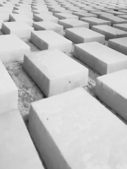Testing the layout for a custom terrazzo floor. These small cement "biscuits" are laid out by hand on-site to finalize the pattern, spacing, and overall feel before they are permanently set.