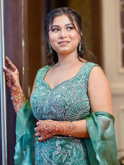 A beautiful, soft-lit portrait of the guest, her makeup looking fresh and glowing.