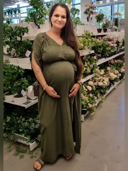 A photo of me during pregnancy, part of my transformation journey.