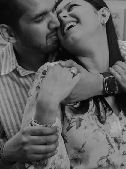 The beauty of uninhibited laughter. This black and white close-up from a pre-wedding shoot focuses on a moment of pure joy and connection.