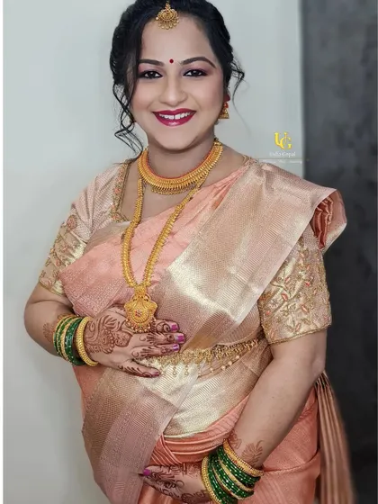 There's nothing more special than a baby shower. Here is the glowing mom-to-be, Shweta, looking absolutely radiant. We chose a soft, peachy-pink makeup look to complement her beautiful saree and the happy occasion.
