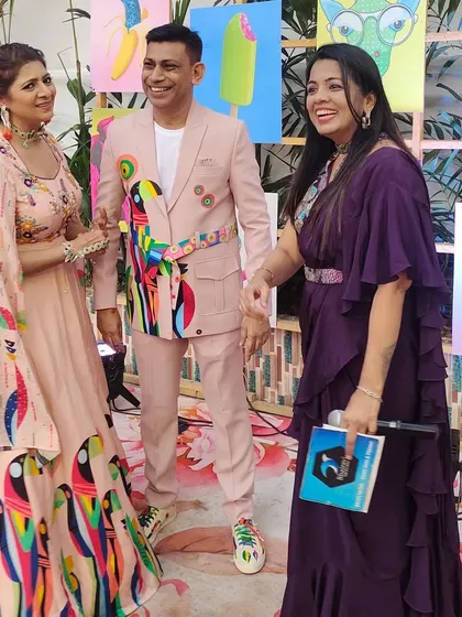 More fun interviews with beautifully dressed guests at the pre-wedding carnival.