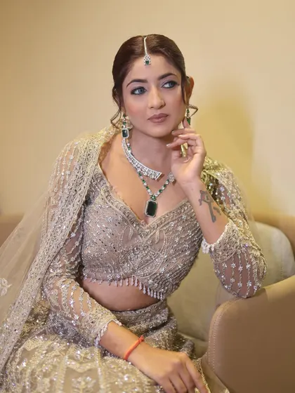 A close up portrait that highlights the sharp, winged eyeliner and perfectly blended eyeshadow. This kind of detail is what makes a look truly stand out for an evening event.