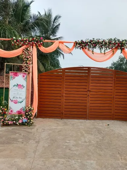 A wide view of the entrance gate, showing how we can transform any space to welcome your guests in style.