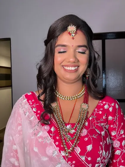 A close-up of the eye makeup for this reception look. The soft shimmer and defined lashes make her eyes the star of the show.