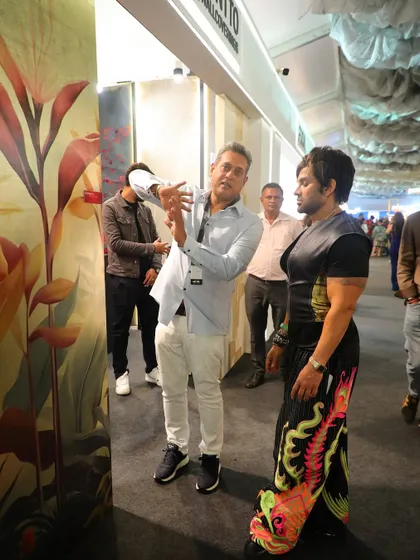 Our founder in conversation with Yash Birla at the Ajio Luxe Weekend, discussing the artistry and inspiration behind one of our vibrant tropical wall panels.