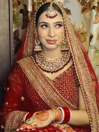 A stunning close-up of our bride's makeup. The focus here is on the blended smokey eye and the perfectly defined brows, creating a look that is both bold and elegant for her big day.