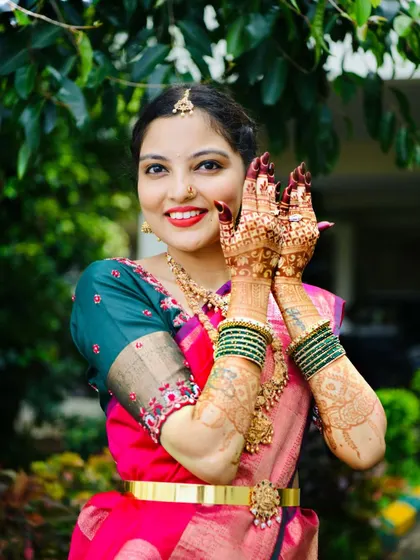 A happy client with a gorgeous, dark mehndi stain. Her smile says it all. Seeing my clients this happy with their results is the best part of my job.