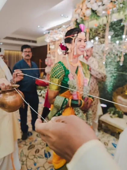 A priest guides the couple through a traditional Marathi wedding ritual. We document every step of the ceremony to create a complete visual story of the day.