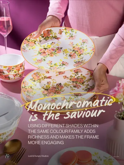 A monochromatic setup for a floral Borosil dinner set. Using different shades of pink in the background and props adds richness and makes the product feel more luxurious and coordinated.