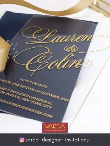 Announce your special day with sleek, modern elegance. This 'Save the Date' card, crafted from clear acrylic with gold calligraphy, offers a contemporary and luxurious first impression for a stylish wedding celebration.