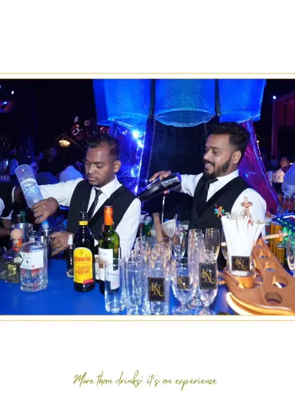 Two of our bartenders working in sync to manage a busy event in Hyderabad. Their teamwork and professionalism ensure that service is always efficient and high-quality.