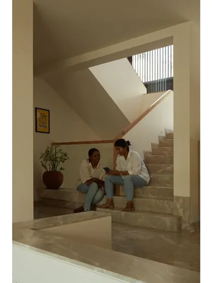 A different angle of the staircase, showing how it connects the different floors of the home.