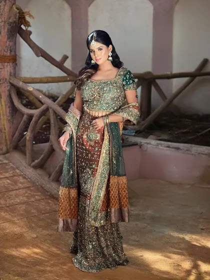 A full-length shot showcasing a complete bridal look created during a student portfolio shoot. This demonstrates how makeup, hair, and styling come together to create a cohesive and stunning final image.