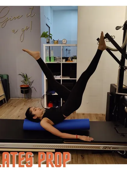 Let's talk about the foam roller. This prop helps release muscle tension, increase your range of movement, and improve strength and coordination.