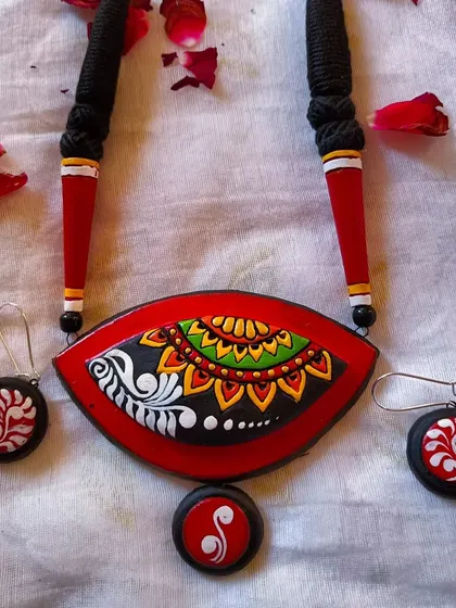These are additional images and videos showing the wide assortment of necklace sets in various designs and colors that I have available for wholesale.