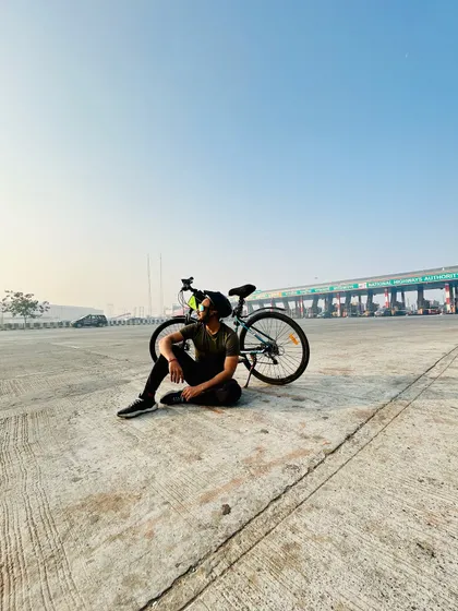 Taking a moment to soak it all in. After a 100km ride, the feeling of accomplishment is best enjoyed with your trusted bike by your side.