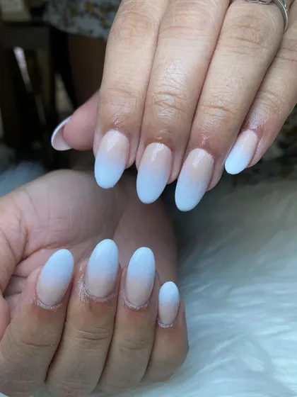 Another view of our popular ombre nails, this time with a slightly cooler, bluish-white tip for a modern twist.