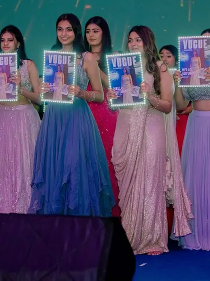 A fun and creative moment from a bridesmaids' dance, using custom Vogue magazine covers featuring the bride. It's these little details that make a performance special.