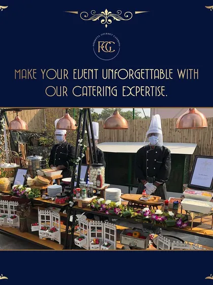 Our chefs are ready to serve at a themed live station. This setup, complete with charming white picket fences and floral decor, demonstrates how we customize our stations to match your wedding's aesthetic.
