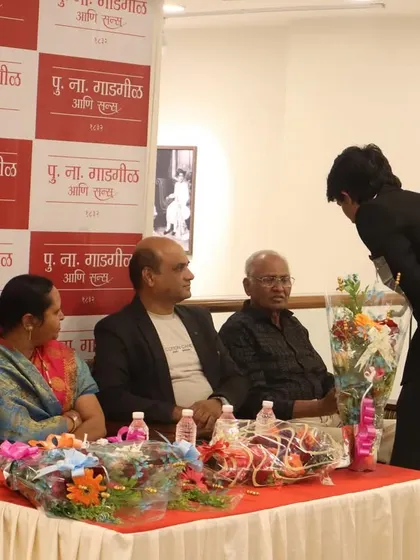 A young artist paying his respects on stage during the inauguration ceremony. It is heartening to see such respect for art and artists from the younger generation.