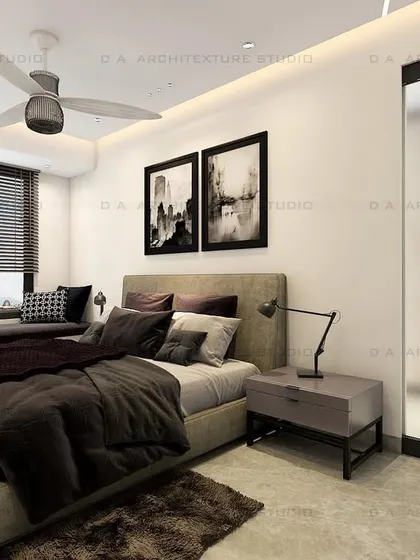 Another view of the Rohini bedroom, showcasing a minimalist aesthetic with black and white art and a sleek sliding door.