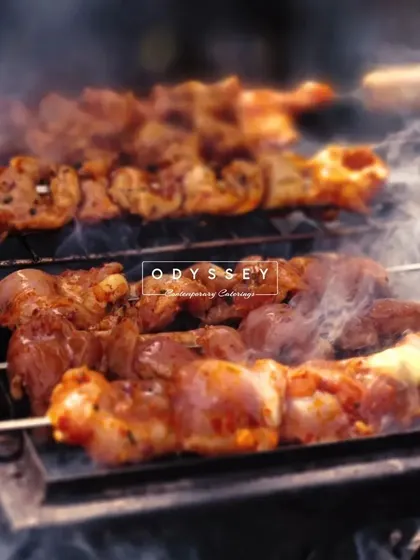 A close-up of our live grill, showcasing the quality of the meat and the smoky, delicious results. This is a perfect choice for adding excitement to your event.