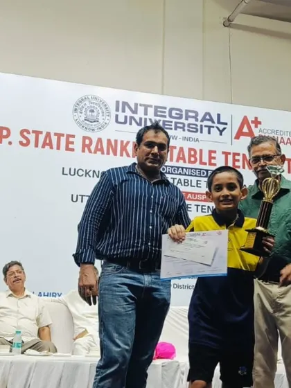U-11 Boys Gold Medalist Aryaveer Borah with his trophy and certificate at the 2nd UP State Ranking Tournament. A proud moment for him and his coaches.