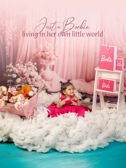 Just a Barbie living in her own little world. This wide shot captures the full, dreamy essence of the pink floral Barbie theme, complete with soft clouds and accessories.