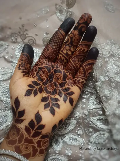 The matured stain of my organic henna cones is deep, dark, and beautiful. This photo shows a bold floral design with a stunning result.