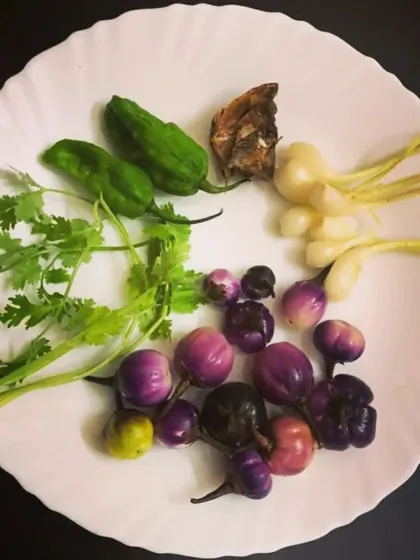 Here you can see the famous king chilli (the green peppers) alongside the other essential Naga ingredients. This is what gives my pickles their signature heat and flavour.