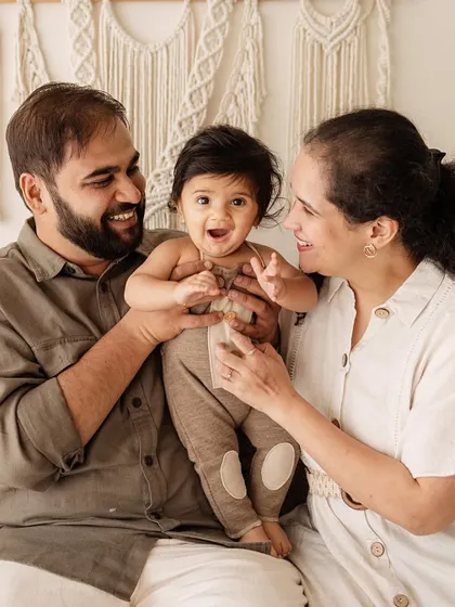 The purest joy. I love capturing these candid, playful moments between parents and their growing baby during our milestone sessions.