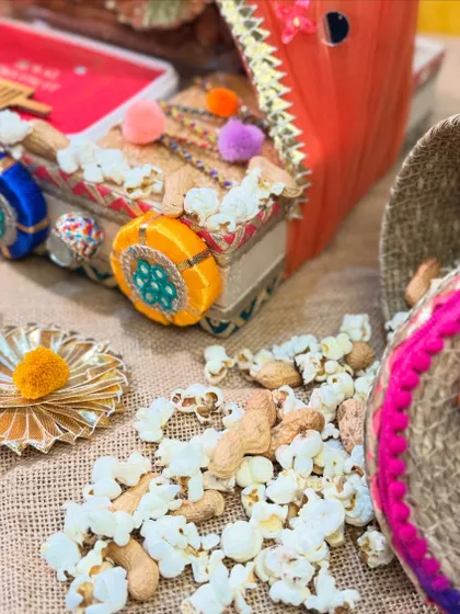 This image shows the traditional Lohri snacks of popcorn and peanuts, ready to be packed into our beautiful, handcrafted hampers.