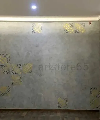 A wider view of the stenciled accent wall, showing how the patterns are placed to create a balanced and artistic composition. This project was completed for a residence in Bengaluru.