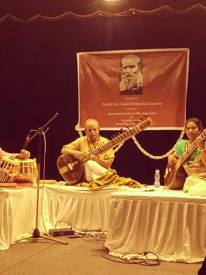 A cherished memory performing alongside my respected guruji, Pandit N V Gopinath. This image captures a traditional Indian classical concert format, often featuring a sitar and tabla duo.