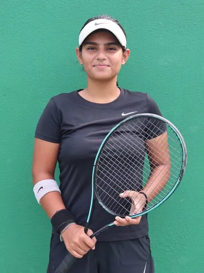 NTC player Navy Dabas after her perfect run at the Delhi Olympics, where she clinched the winner's trophy.