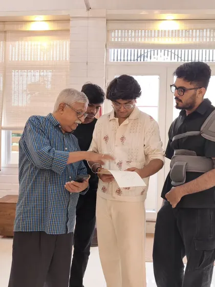 Senior Cartoonist Sridhar Comaravalli in discussion with our curator and visitors at the "Vernissage" Art Exhibition. We foster an environment of learning and dialogue.