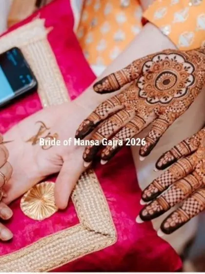 The process of creating minimal magic. Here, I am adding a small initial to the bride's palm, a personal touch to her otherwise clean and elegant mandala design.