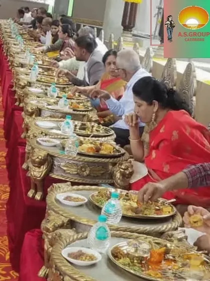 For a truly royal wedding experience, I offer ornate, elevated seating and thali arrangements. This setup provides guests with a unique and luxurious dining atmosphere.