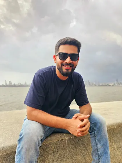 A relaxed shot at Marine Drive in Mumbai. The iconic location and casual attire make this a great image for brands targeting the urban Indian youth.