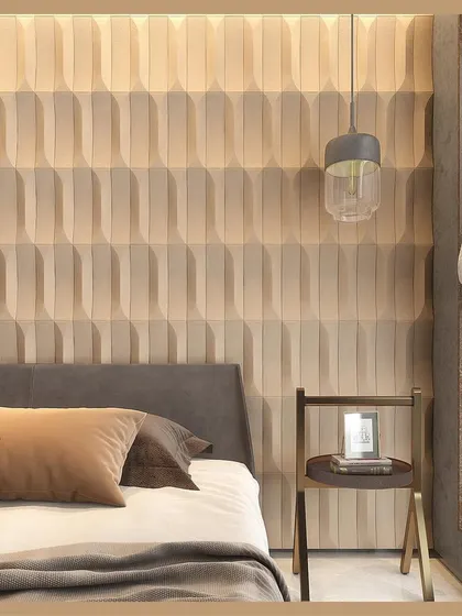 For this bedroom, we created a wall panel with repeating geometric patterns in a light, earthy tone. The 3D texture adds visual interest and a sense of refined calm, proving that minimalism can have a powerful impact.