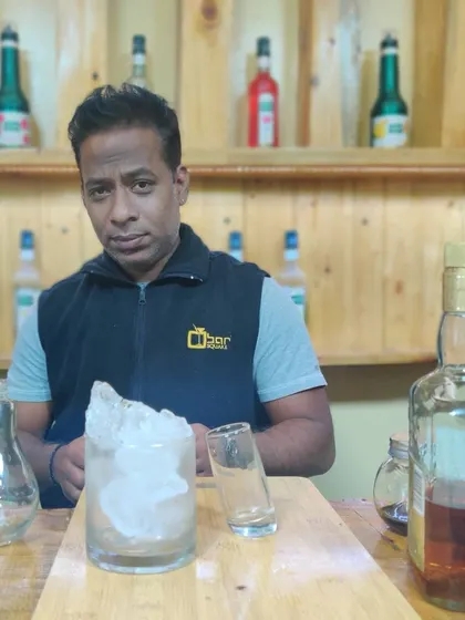 A student takes his place behind the bar, ready for a session. This is where the journey from enthusiast to professional bartender begins.