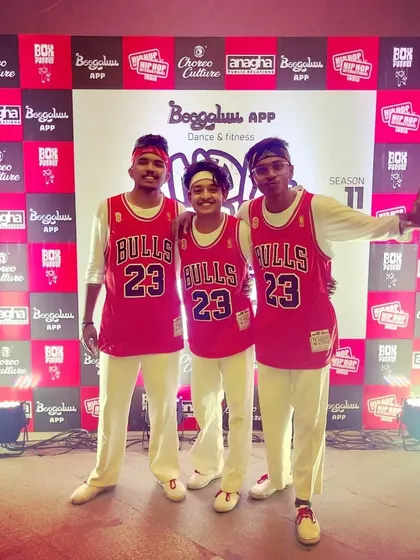 Posing with my crew at the championship. The experience of competing together is a huge part of our journey, and we learn from every win and every mistake.