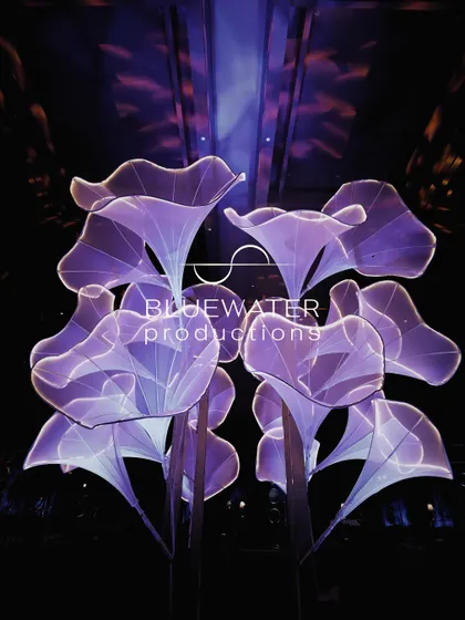 A closer view of the illuminated fabric florets, showcasing their delicate, petal-like form.