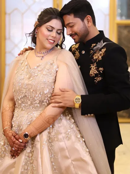 A romantic couple shot, with the bride and groom looking at each other. Her soft makeup is perfect for this intimate moment.