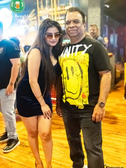 Posing with a fan before my set in Kolkata. The energy is already building.