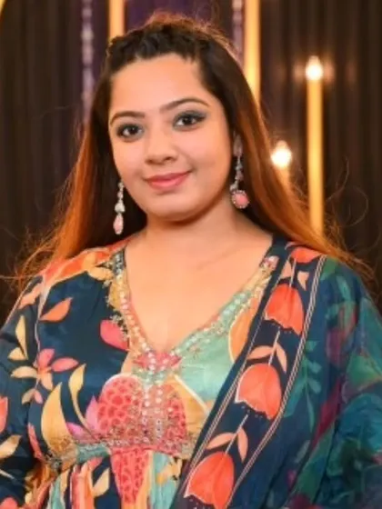 A close-up shot from a recent Sangeet, where my focus is always on the energy of the room and the happiness of the guests. My colorful outfit reflects the vibrant mood of the celebration.