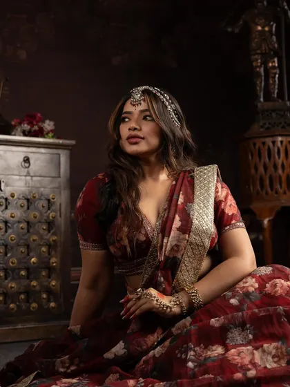 A full-length shot capturing the complete mood of the Heeramandi-inspired look. The makeup, hair, outfit, and setting all come together to tell a story of timeless grace.